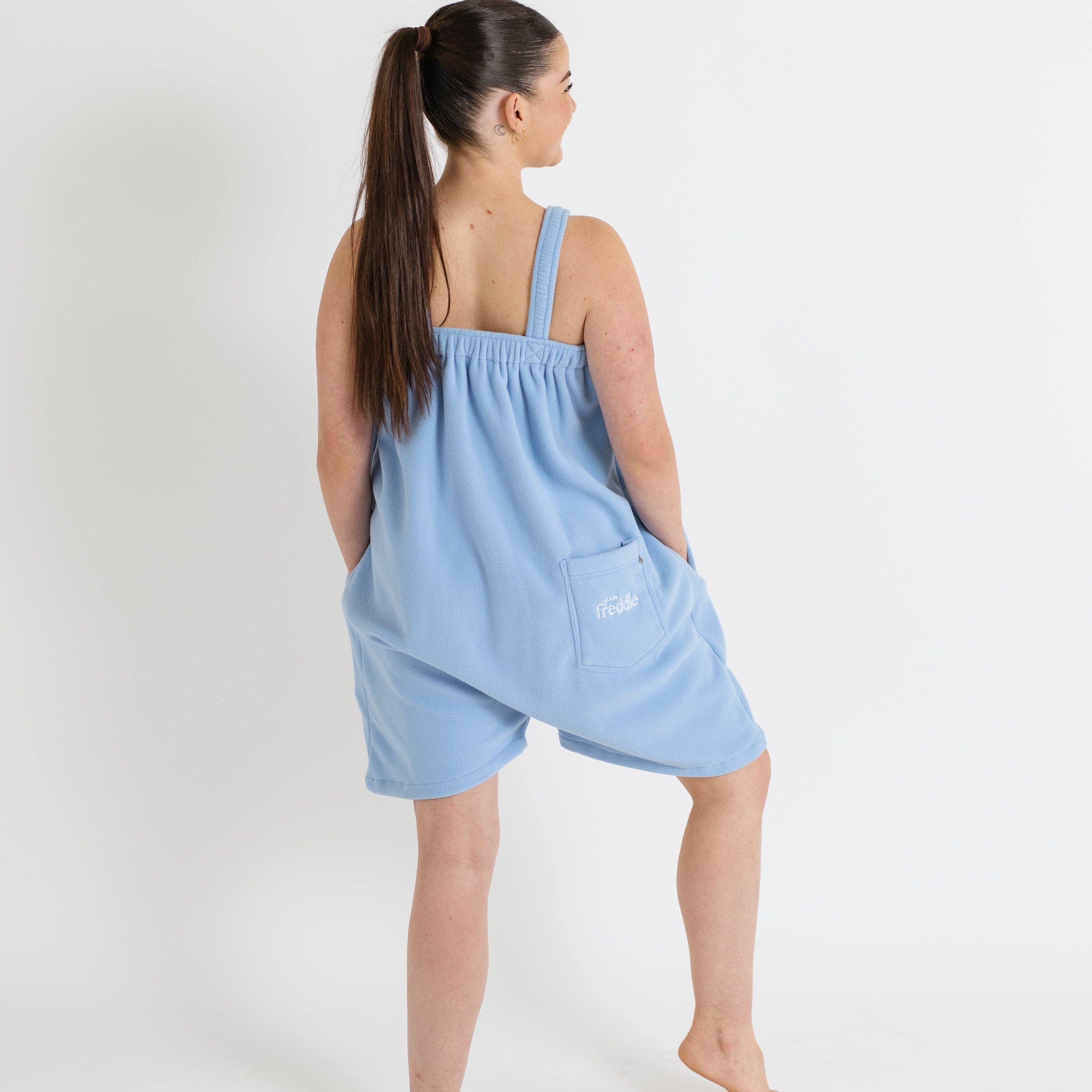 Woman wearing a light blue Ready Freddie  in short style 