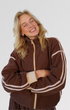 Brown fleece zip-up with signature stripe detail