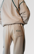 Cream track pants in short and long lengths, S/M and L/XL