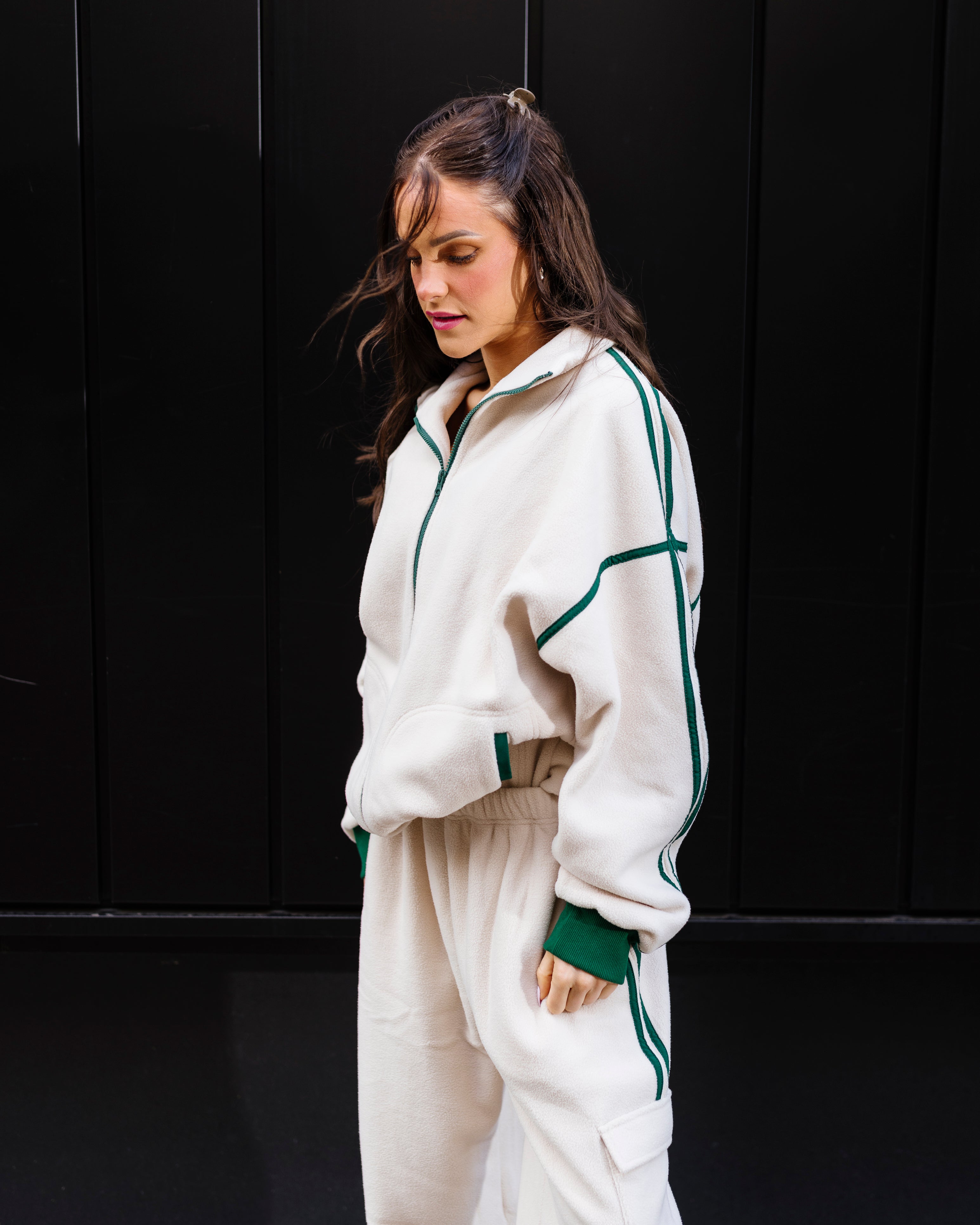 Cream fleece zip-up with signature stripe detail