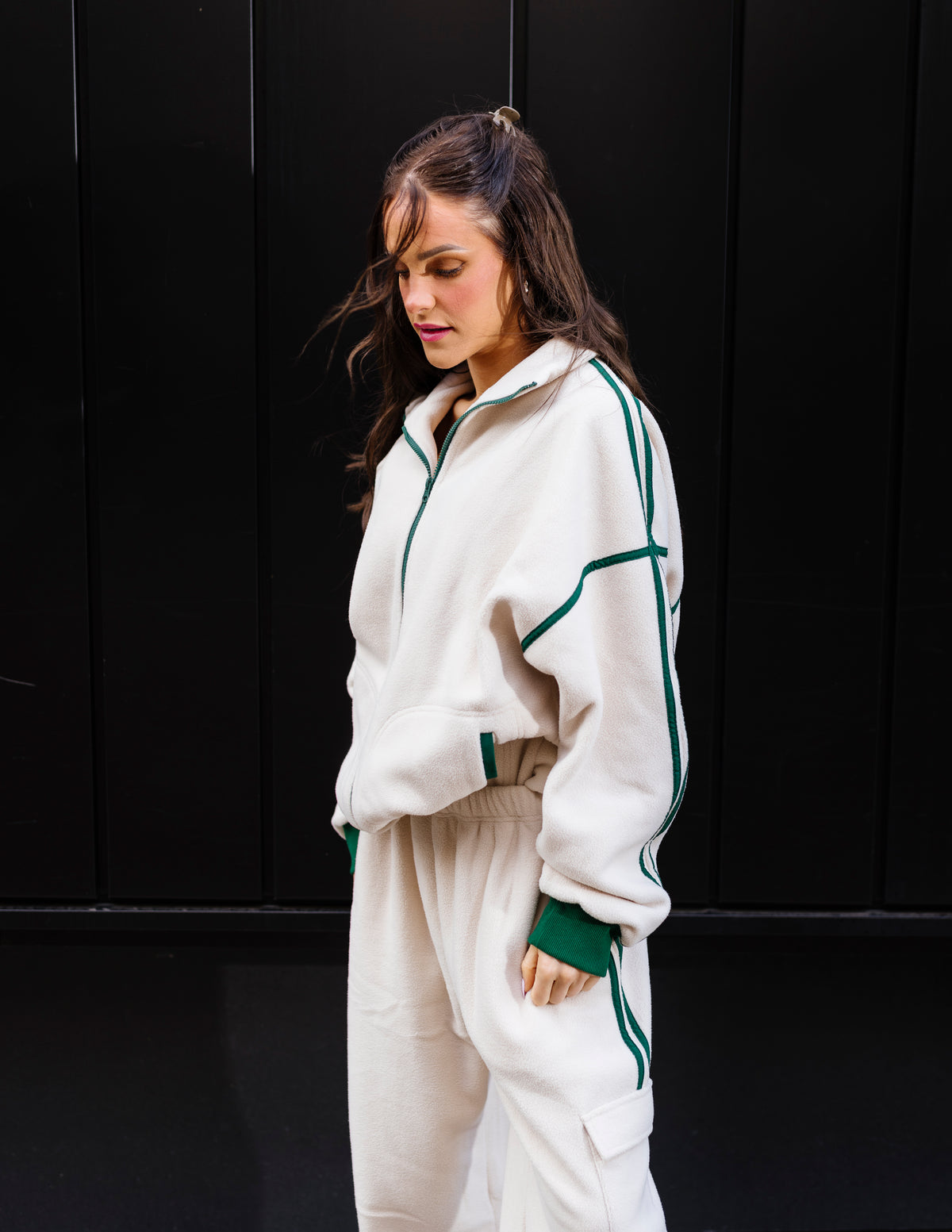 Cream fleece zip-up with signature stripe detail