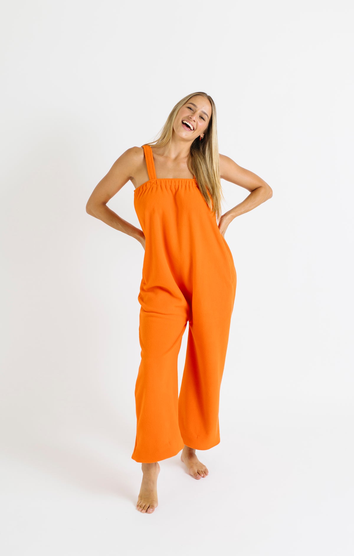 Orange long onesie in 100% polyester polar fleece