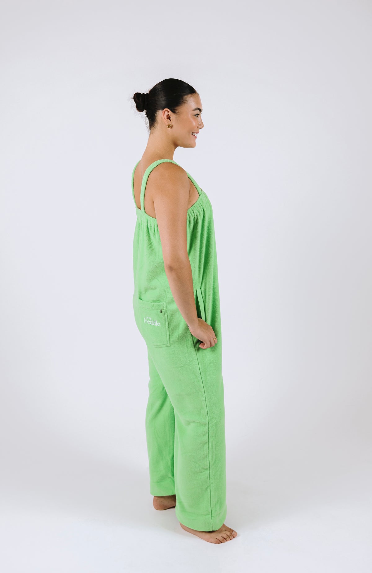 Lime green long fleece onesie for getting ready
