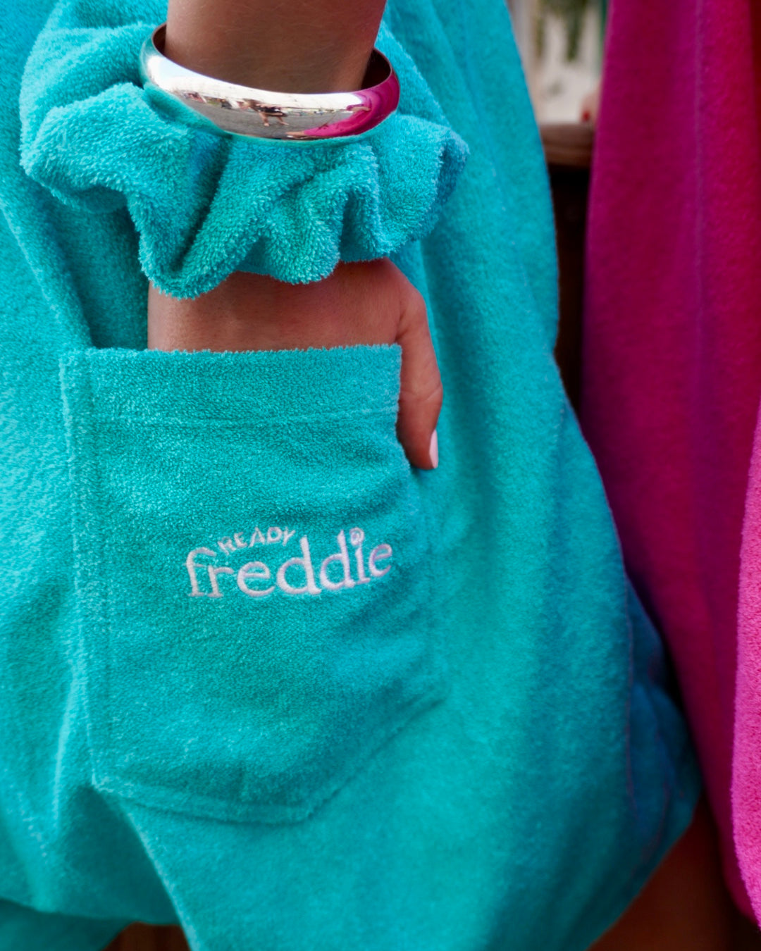 Ocean blue terry towelling onesie for after the shower