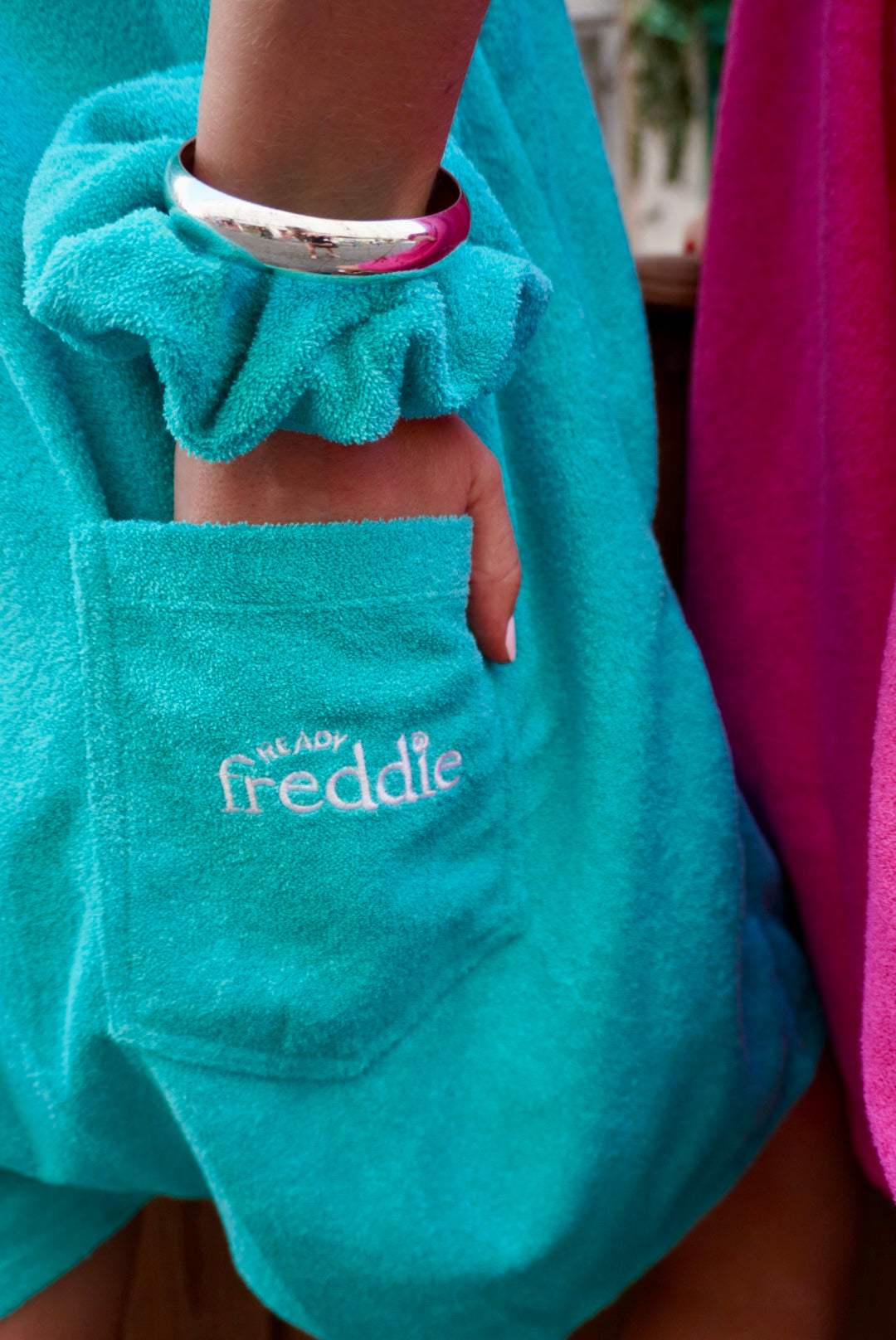 Ocean blue terry towelling onesie for after the shower