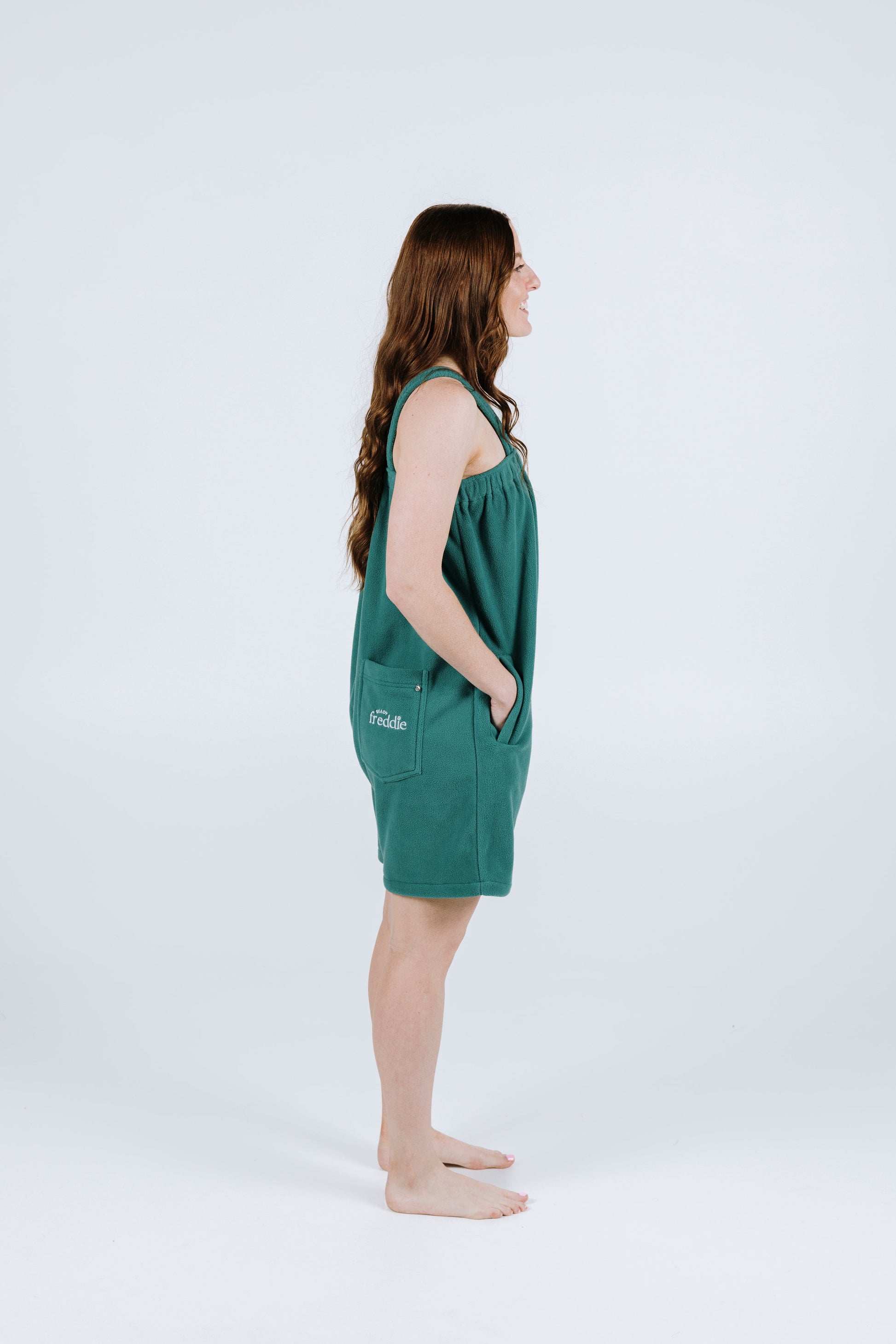 Teal green short fleece onesie for getting ready