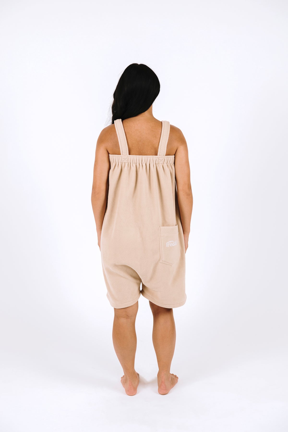 Beige short fleece onesie for getting ready
