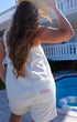 Bride getting-ready fleece onesie in wedding white